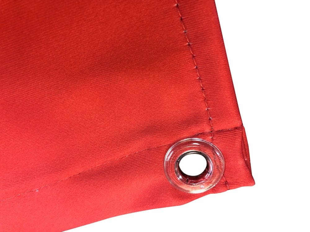Eyelet on textile backlight material