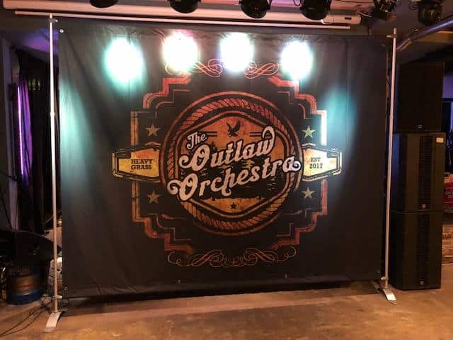outlaw orchestra backdrop stand