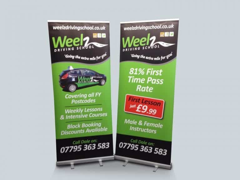 Roller Banners advertising a Driving Scool